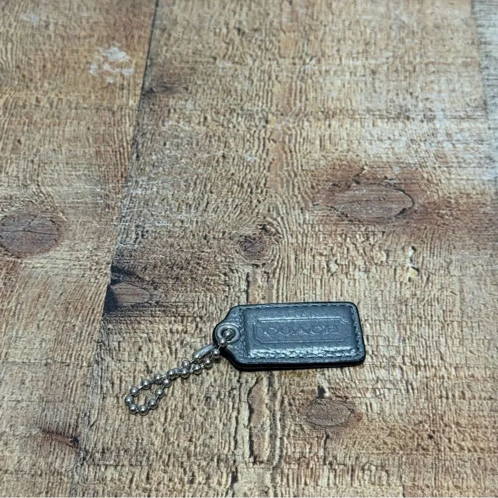 COACH Hang tag Metallic gray Silver Leather Fob Bag Charm Keychain